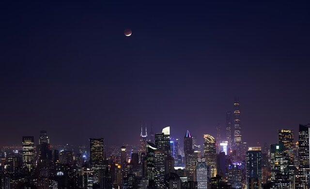 تصاویر طولانی‌ترین ماه‌گرفتگی جزئی قرن,عکس های ماه گرفتگی نوامبر 2021,تصاویری از ماه گرفتگی قرن در 18 نوامبر 2021