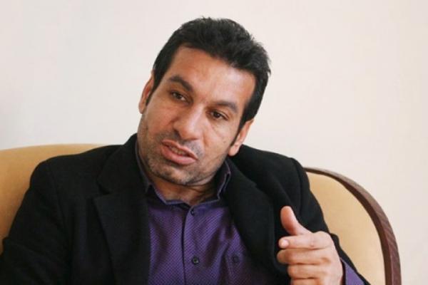 محمد مومنی,انتقاد محمد مومنی از سازمان لیگ