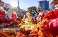 تصاویر جشنواره بزرگ تهیه خوراک کیمچی در کره جنوبی,عکس های جشنواره بزرگ تهیه خوراک کیمچی,تصاویری از جشنواره کیمچی در کره جنوبی