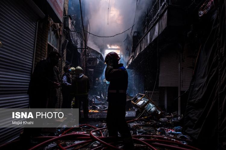 تصاویر آتش‌سوزی در بازار بزرگ تهران,عکس های آتش سوزی در بازار تهران,تصاویر آتش گرفتن بازار تهران