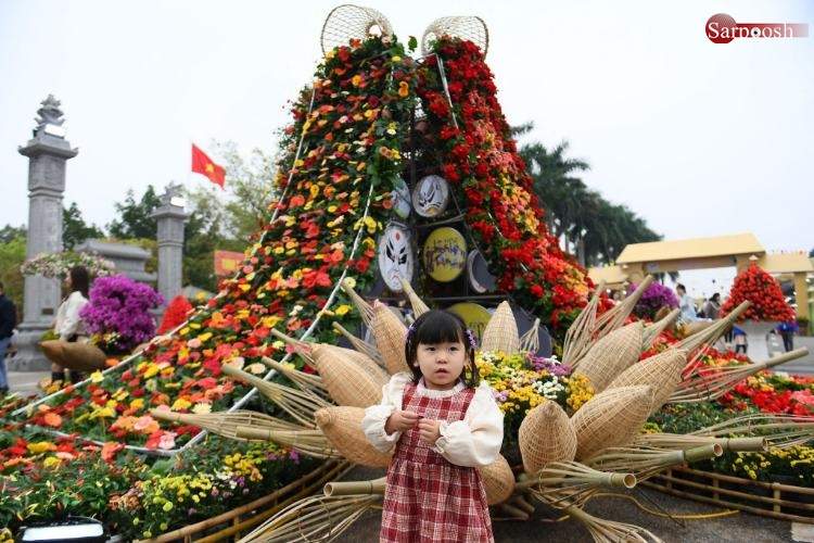 تصاویر جشنواره گل در ویتنام,عکس های جشنواره گل در هانوی,تصاویری از جشنواره گل در هانوی ویتنام