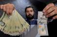 قیمت دلار در دولت رئیسی,کنایه قالیباف به روحانی درباره قیمت دلار