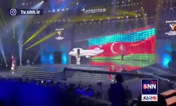فیلم/ آتش زدن پرچم آذربایجان توسط یک ارمنستانی در مسابقات وزنه‌برداری