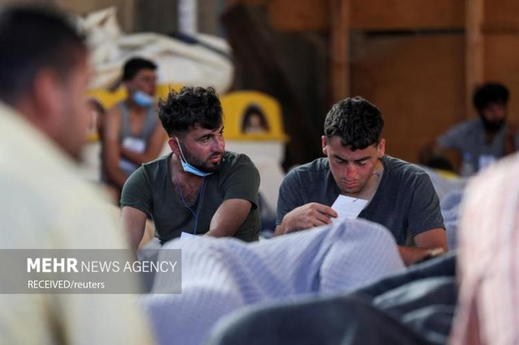 تصاویر واژگونی قایق مهاجران درسواحل یونان,عکس های واژگونی قایق مهاجران درسواحل یونان,تصاویری از واژگونی قایق مهاجران درسواحل یونان