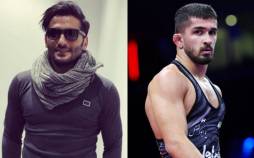 امیرمحمد یزدانی و جواد کاظمیان,آشتى كشتى و فوتبال با پادرميانى سرمربى تيم ملى