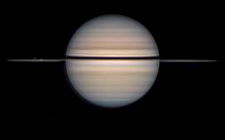 عکس روز ناسا از گذر قمرهای یخی از برابر حلقههای زحل زحل,عکس روز ناسا از گذر قمرهای یخی از برابر حلقههای زحل