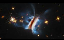 قرص پیش‌سیاره‌ای,عکس تلسکوپ فضایی هابل از قرص پیش‌سیاره‌ای ساندویچ دراکولا