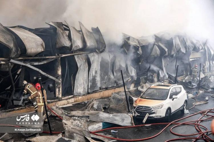 تصاویر آتش‌سوزی بازارچه جنت‌آباد تهران,عکس های آتش‌سوزی بازارچه جنت‌آباد تهران در 14 بهمن 1404,تصاویری از آتش گرفتن بازار جنت در تهران