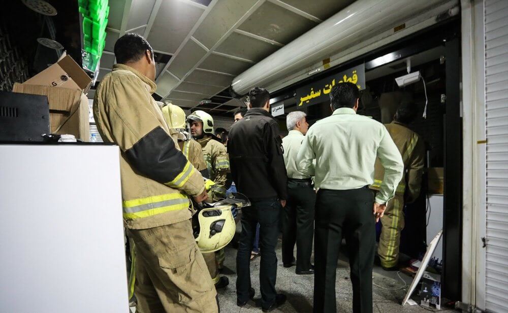 عکس های آتش سوزی ساختمان علاالدین تهران,تصاویر آتش سوزی ساختمان علاالدین تهران,عکس های آتش سوزی بازار موبایل علاالدین تهران