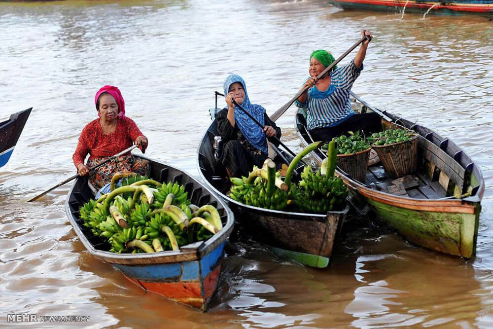 تصاویربازارچه شناورشرق آسیا,عکس های بازارچه شناورشرق آسیا,تصاویرجاذبه های شرق آسیا