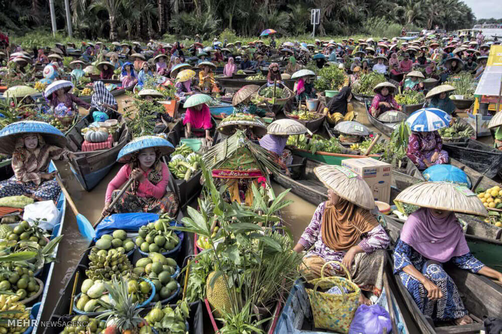 تصاویربازارچه شناورشرق آسیا,عکس های بازارچه شناورشرق آسیا,تصاویرجاذبه های شرق آسیا