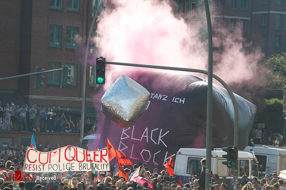 عکس اعتراضات گسترده علیه اجلاس G۲۰ در هامبورگ,تصاویراعتراضات گسترده علیه اجلاس G۲۰ در هامبورگ,عکس معترضین در هامبورک