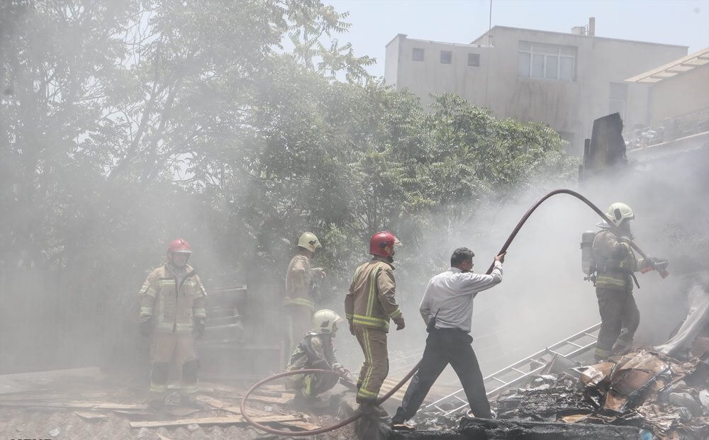 تصاویرآتش‌سوزی انبار کالا,عکس های آتش‌سوزی انبار کالا در میدان بهارستان,آتش‌سوزی انبار کالا در میدان بهارستان