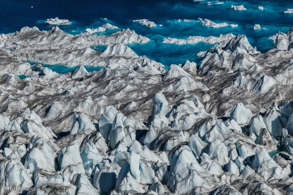 عکس آب شدن یخ,تصاویر آب شدن یخ,عکس آب شدن یخ در قطب شمال