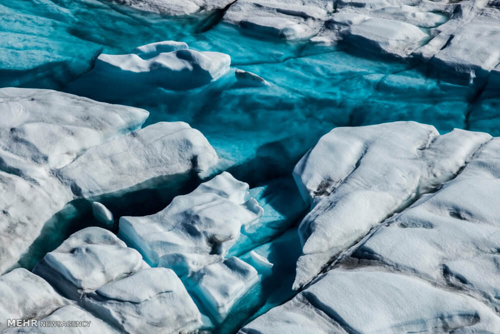 عکس آب شدن یخ,تصاویر آب شدن یخ,عکس آب شدن یخ در قطب شمال