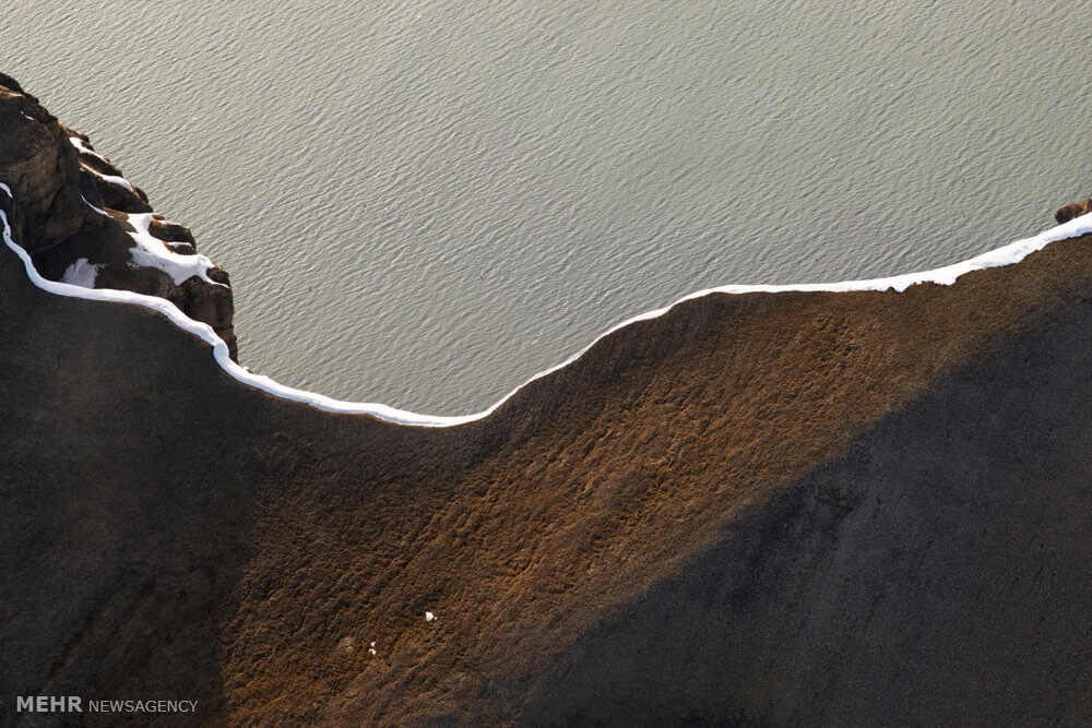 عکس آب شدن یخ,تصاویر آب شدن یخ,عکس آب شدن یخ در قطب شمال