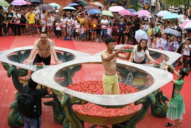 تصاویر جذاب و دیدنی مسابقه فلفل‌خوری در چین,عکسهای جذاب و دیدنی مسابقه فلفل‌خوری در چین,تصویر جذاب مسابقه فلفل‌خوری در چین