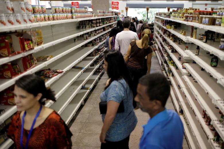 تصاویر فروشگاه های مواد غذایی ونزوئلا,عکس هجوم مردم ونزوئلا به فروشگاه‌ ها,عکس های وضعیت مردم ونزوئلا