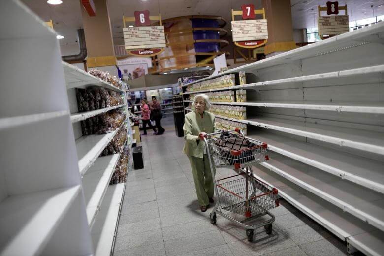 تصاویر فروشگاه های مواد غذایی ونزوئلا,عکس هجوم مردم ونزوئلا به فروشگاه‌ ها,عکس های وضعیت مردم ونزوئلا