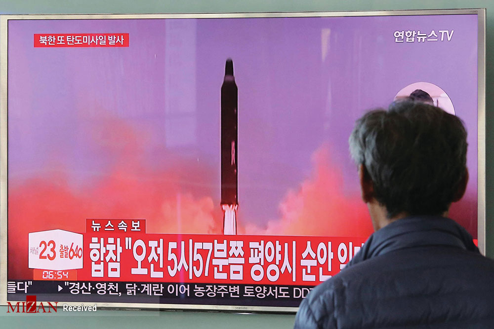 تصاویر آزمایش موشکی کره شمالی,عکس پرتاب موشک به سمت ژاپن,عکس های موشک بالستیک کره شمالی