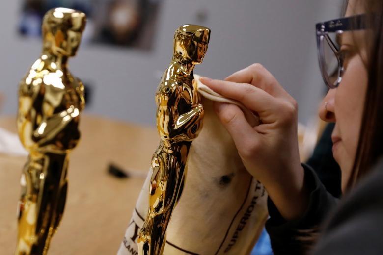 تصاویر ساخت مجسمه اسکار,عکسهای مراحل ساخت مجسمه اسکار,عکس های ساخت جایزه اسکار از طلا