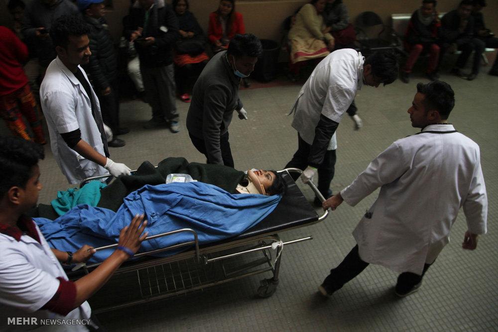 تصاویر سقوط هواپیما در نپال,عکس های سقوط هواپیمای مسافربری بنگلادش,تصاویر سقوط هواپیما در فرودگاه کاتماندو