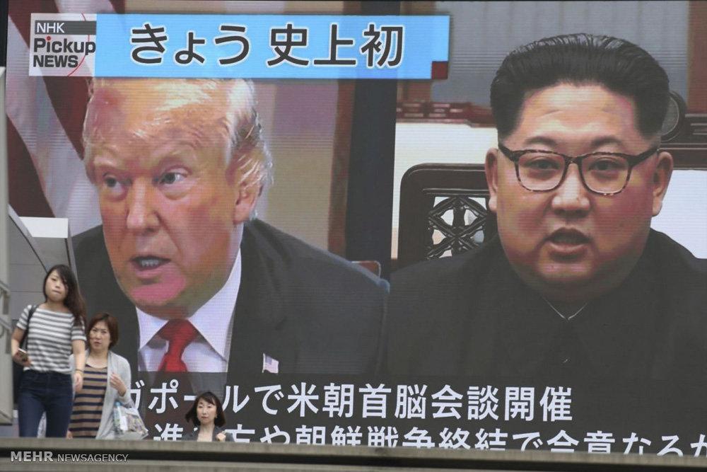 تصاویر واکنش ها به ملاقات رهبران آمریکا و کره شمالی,عکس های واکنش مردم به دیدار رهبران آمریکا و کره شمالی,تصاویر واکنش سیاستمداران کشورها به دیدار ترامپ وکیم جونگ اون