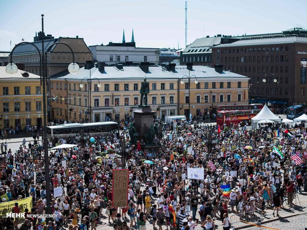 عکس تظاهرات در هلسینکی,تصاویرتظاهرات در هلسینکی,عکس تظاهرات قبل از دیدار ترامپ و پوتین