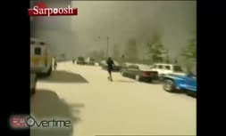 فیلمی نادر از حادثه ۱۱ سپتامبر؛ چیزی مثل شمشیر از آن بالا آمد و به برج خورد