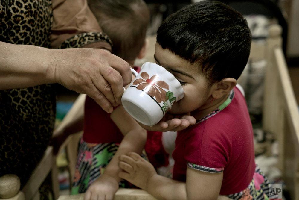 عکس های بچه های یتیم داعش,عکس های از فرزندان گروه داعش,تصاویر بچه های اعضای داعش در عراق