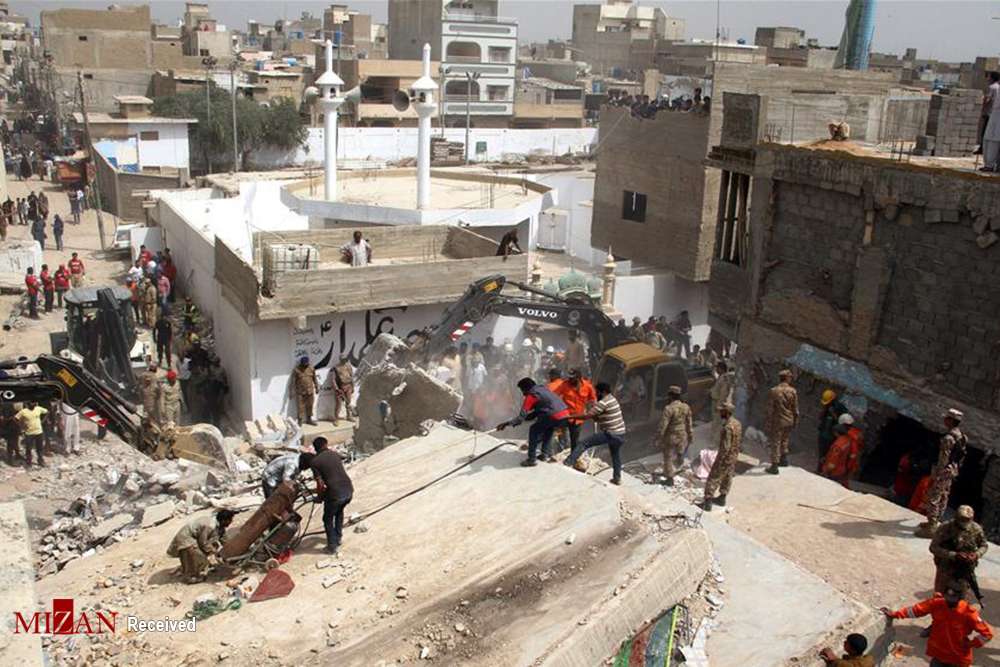 تصاویر ریزش ساختمان در پاکستان,عکس های حادثه در پاکستان,تصاویر ریزش ساختمان در کراچی