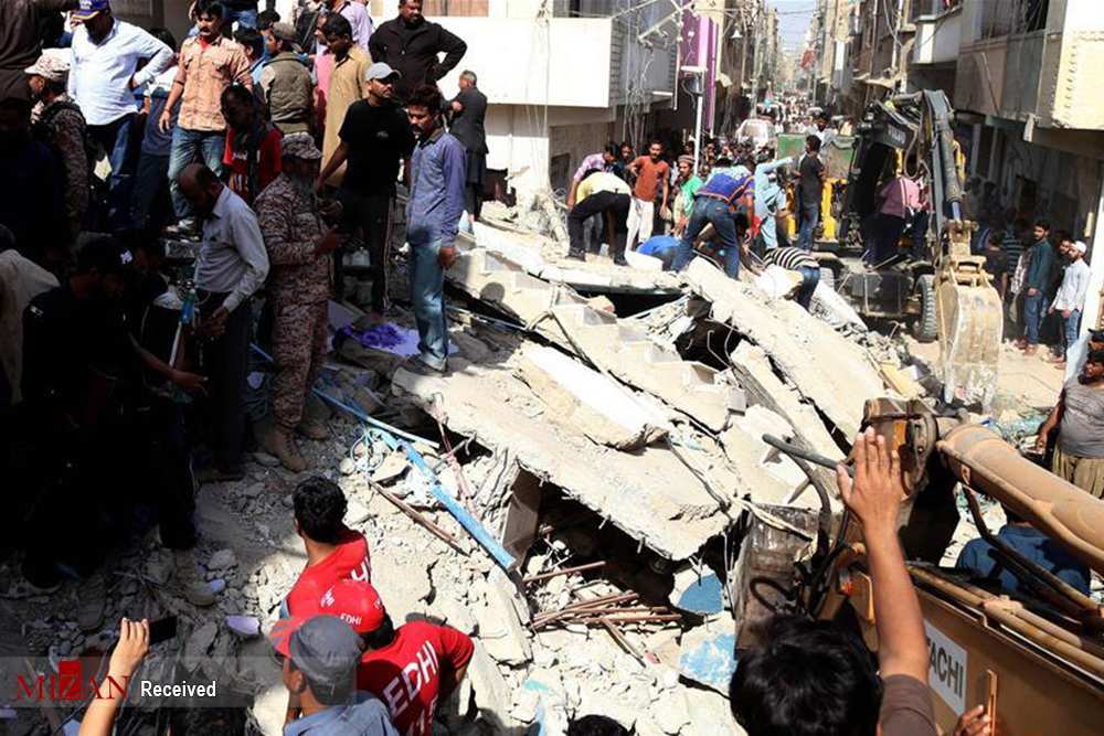 تصاویر ریزش ساختمان در پاکستان,عکس های حادثه در پاکستان,تصاویر ریزش ساختمان در کراچی