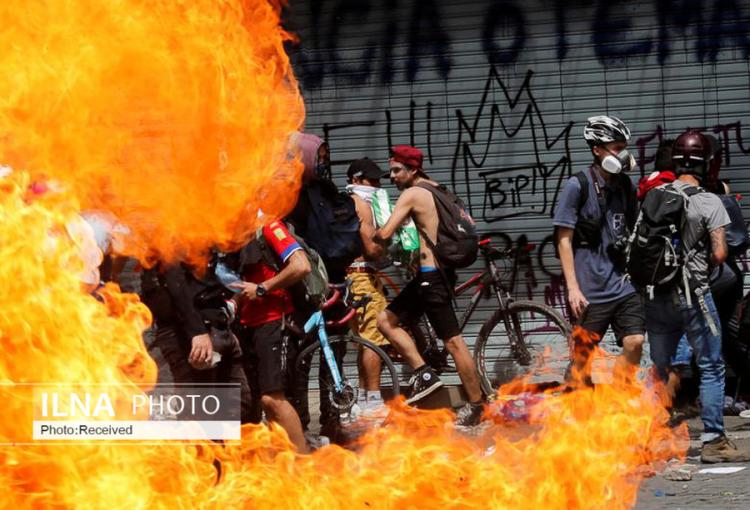 تصاویر اعتراضات و شورش در شیلی,عکس های تظاهرات مردمی در شیلی,تصاویری از اعتراضات در شیلی
