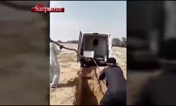 فیلم/ نحوه عجیب دفن یک فوتی مبتلا به کرونا در عراق