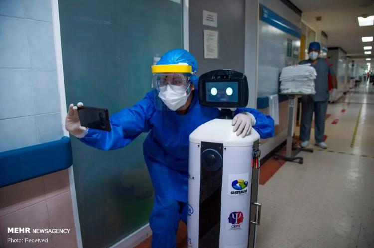 تصاویر استفاده از ربات‌ها برای مقابله با کرونا,عکس های ربات ها در بیمارستان ها,تصاویری از حضور ربات ها در بیمارستان ها