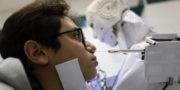 انجام تست کرونا با ربات